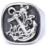 Detail of nautical anchor relief on square stainless steel shield ring for men