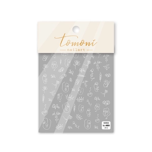Close-up of TO-480 nail stickers with white abstract face and floral line art designs