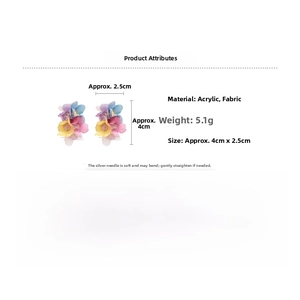 Macro shot of colorful chiffon flower earrings with acrylic center and dimensions 4cm x 2.5cm