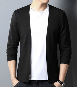 Close-up of black V-neck knit cardigan showing detailed texture and premium fabric weave
