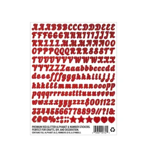 Macro detail of red glitter alphabet and number stickers with a sparkling textured finish