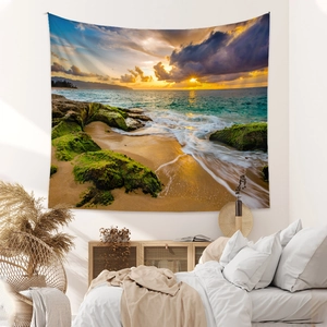 Détail d'une tapisserie bohème de coucher de soleil sur la plage sur un mur de chambre