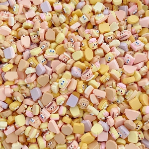 Macro shot of colorful resin miniature food charms for DIY jewelry and nail art