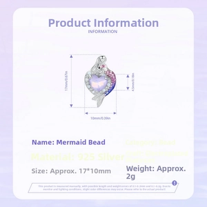 Macro view of 925 silver mermaid heart charm with purple gemstone and blue gradient fins