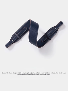 Close-up of 4cm wide blue lychee pattern leather strap with adjustable silver buckle