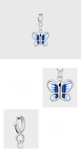 Detailed macro view of 925 sterling silver butterfly pendant with blue enamel and polished finish