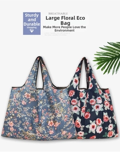 Detail of floral waterproof grocery bags showing blue bird and red rose patterns