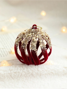 Detail of 8cm burgundy flocked Christmas ball with golden sequins and pearl accents