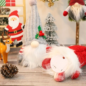 Lighted Christmas gnome plush with gray knit hat and LED glowing base holiday decor