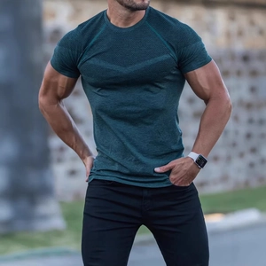 Slim fit men's sport T-shirt in dark green with breathable honeycomb mesh shoulder panels