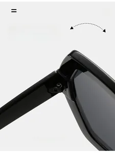 Close-up of durable metal hinge on black oversized square fashion sunglasses