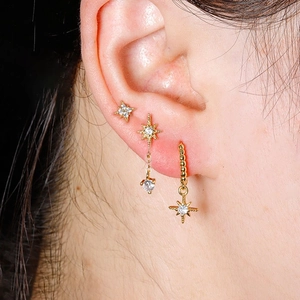 Chic gold star earring set with zircon inlays featuring tassels and geometric studs