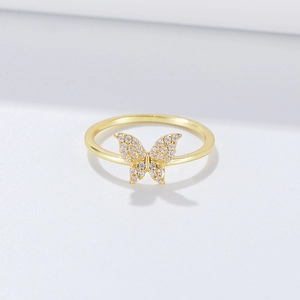 Elegant gold S925 sterling silver butterfly ring with shimmering crystals on white base