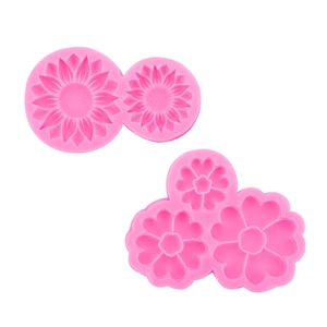 Rosa Silikonformen mit Sonnenblumen und Kirschblüten für DIY-Kerzen und Tortendeko