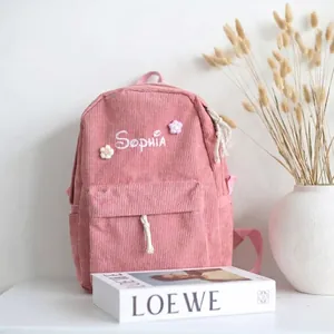 Pink corduroy backpack for girls with Sophia embroidery and knitted flowers