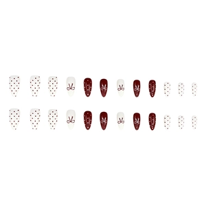 Faux ongles bordeaux et crème à pois avec nœuds élégants en forme d'amande