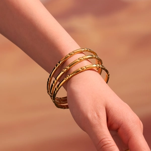 Three-piece gold-plated stainless steel bangles with natural bamboo joint texture design