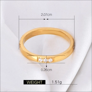 18K gold plated titanium ring with 12 zircon stones on white silk, 2.07cm diameter
