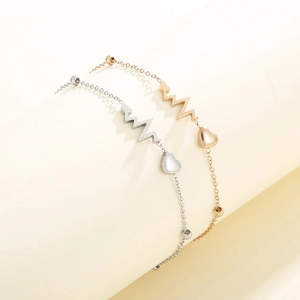 Minimalist heartbeat heart charm bracelets for couples in silver and rose gold finishes