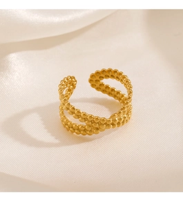 Detail of 18K gold plated ring with double-layered beaded texture on white silk