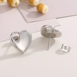 Elegant silver stainless steel heart stud earrings set with a minimalist polished finish