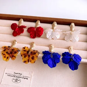 French vintage acrylic flower petal earrings in red, pearl, tortoise, and blue colors