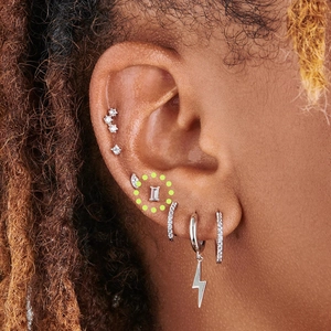 Close-up of S925 sterling silver earring set featuring a rectangle clear zircon stud