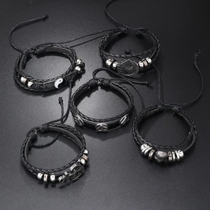 5-piece punk leather bracelet set featuring skull, anchor and yin-yang metal charms