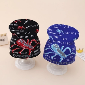 Detail of cyber spider knit beanies showing high-quality jacquard patterns and textures