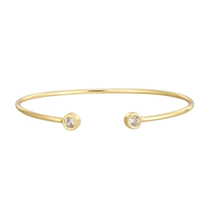 Polished gold open cuff bracelet featuring two sparkling round cubic zirconia stones