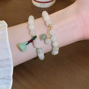 Double-layer beaded bracelet with lotus pendant and green natural stone accents