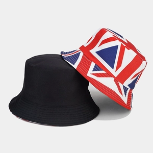 Detail showing a reversible bucket hat with black solid side and British flag pattern
