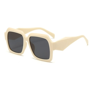 Lunettes de soleil carrées oversize avec monture beige et verres foncés pour mode et protection