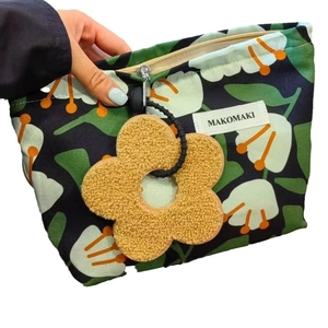 Navy blue tropical floral canvas makeup bag with large capacity and flower charm