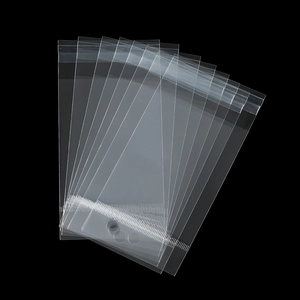 Macro detail of transparent laser OPP self-sealing bags for DIY jewelry and cards