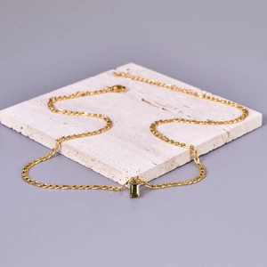 18K gold plated Figaro chain necklace featuring a rectangular green crystal pendant