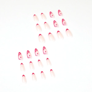 Unghie finte a mandorla rosa stile francese con punte rosse e cuori, set da 24 pezzi