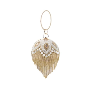 Sparkly spherical pearl evening bag with golden tassels and metallic handle for parties