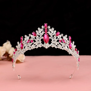 Detail of silver bridal crown with pink marquise stones and white sparkling rhinestones