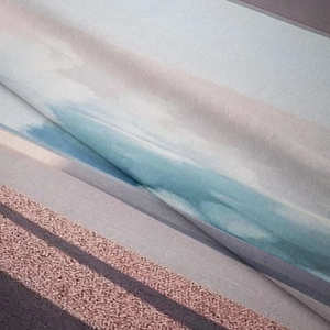 Macro shot showing texture and abstract geometric pattern of the decorative tapestry fabric