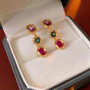 Vintage three-tier earring with oval purple green and red stones in gold bezel