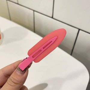Pink matte candy color hair clip featuring seamless design for sweet styling