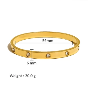 Detailed view of gold stainless steel bangle with 6mm width and 59mm inner diameter