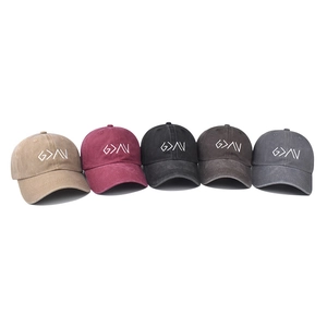 Washed cotton baseball caps with embroidered symbols in five assorted vintage colors