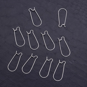 Silver titanium steel kidney earwires for DIY jewelry making set of 10 on dark background