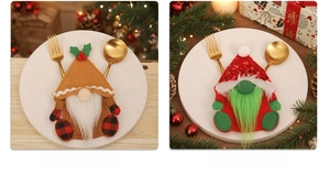 Festive Christmas cutlery holders featuring gnome and Grinch designs on white dinner plates