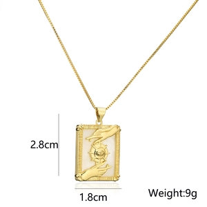 18K gold plated shell pendant necklace with hands and eyes motif on box chain