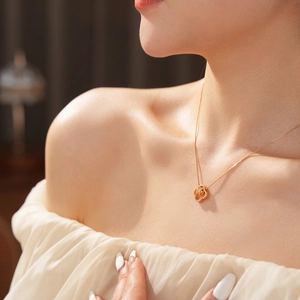 Elegant 18K gold plated necklace featuring a refined rose pendant with zircon stones