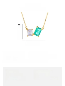 Detail showing dimensions of the zircon cube pendant with gold and silver steel chain