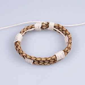 Men's adjustable braided leather bracelet in gold and white with geometric knots